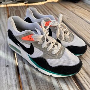 Nike Women's Black, White, and Orange Sneakers